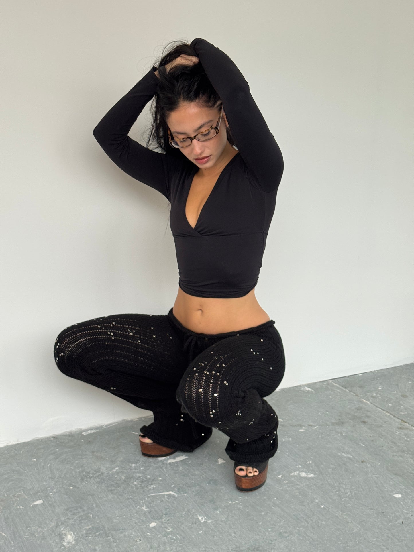 Black studded knit trousers